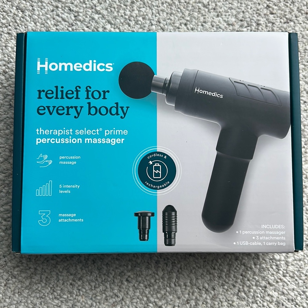 Homedic massager, new never been open.